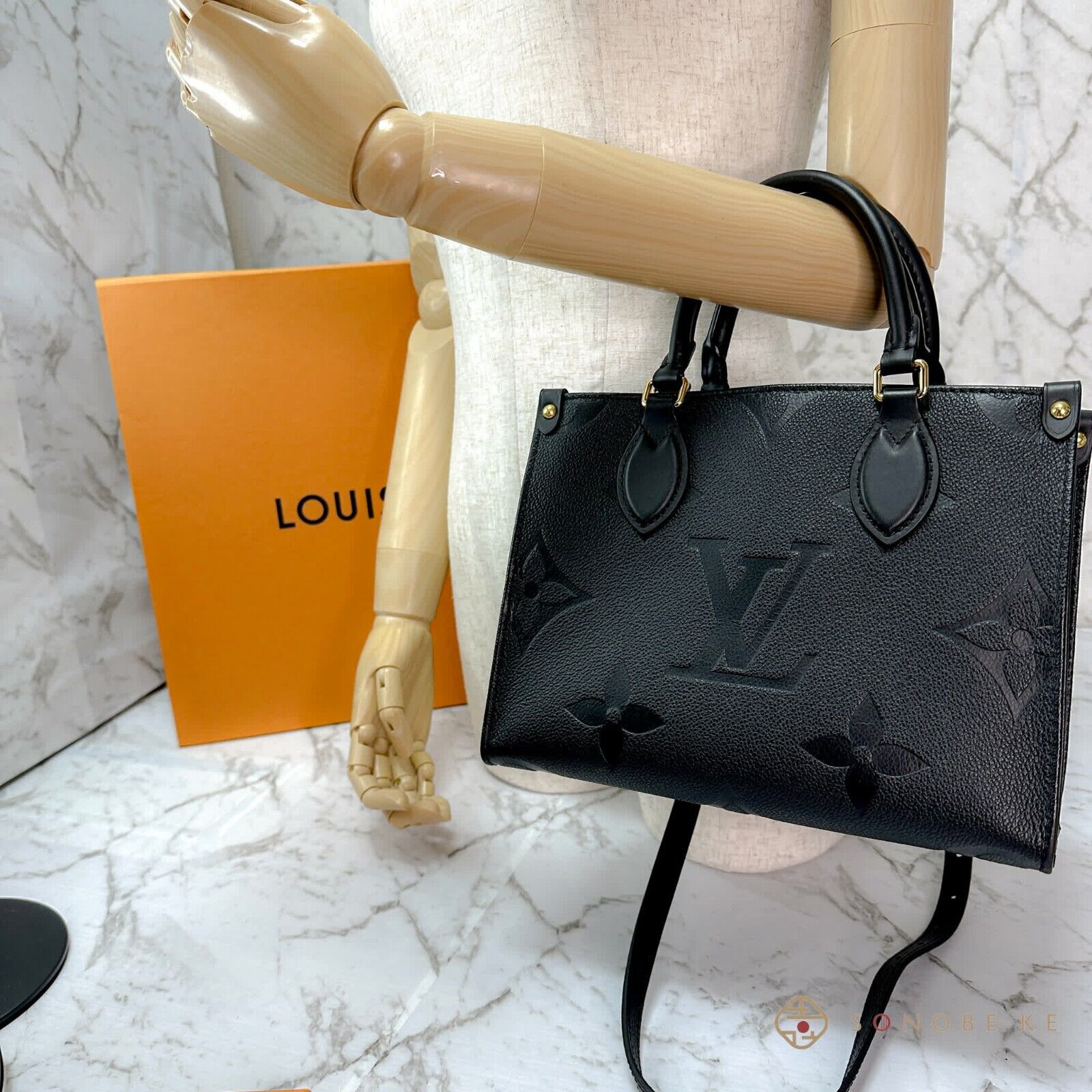 Louis Vuitton On The Go PM Monogram Empreinte Leather Handbag
