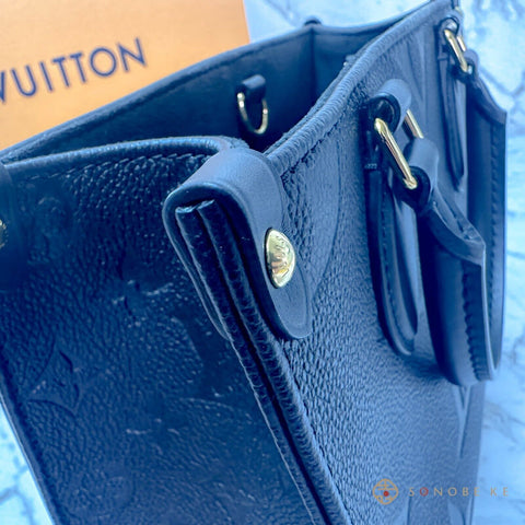  LOUIS VUITTON M45653 Louis Vuitton On The Go PM Monogram  Giant Empreinte Noir : Clothing, Shoes & Jewelry