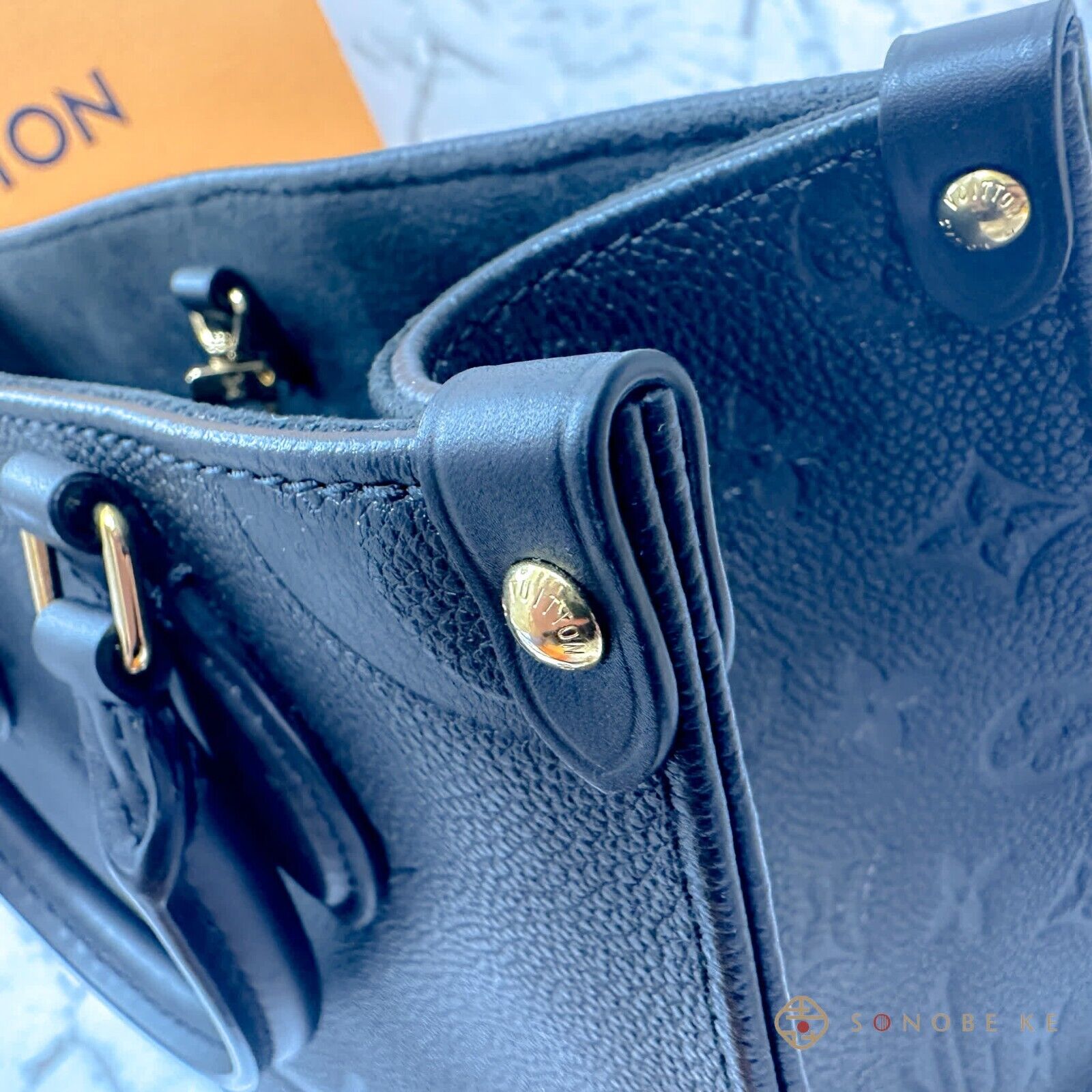 OnTheGo PM Monogram Empreinte Leather - Handbags