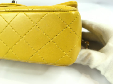 CHANEL lambskin mini matelasse lambskin yellow shoulder bag