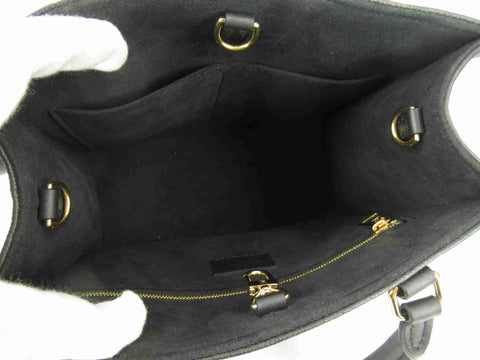 LOUIS VUITTON Louis Vuitton on the go pm noir handbag